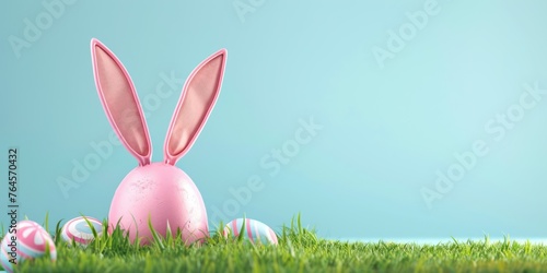 3D illustration of colored Easter egg with rabbit ears on green grass on blue pastel background