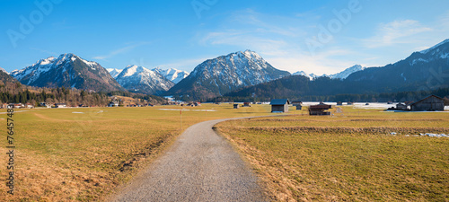 walking and bike route around Oberstdorf tourist resort, view to allgau alps in march