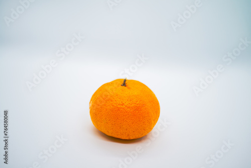 Juicy Tang: Mandarin Fruit Closeup on White photo