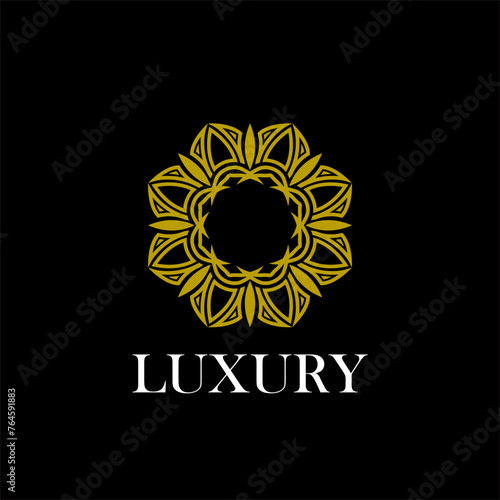 luxury ornamental mandala design background in gold color