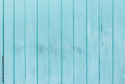 Vintage beach wood background - Old weathered wooden plank painted in turquoise color.