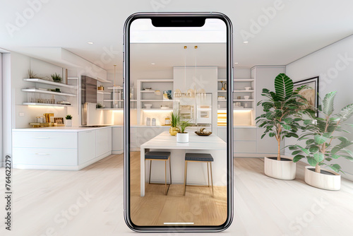 A smart phone is displaying a virtual tour of a kitchen, well-lit and has a modern design