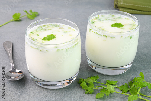 Obraz na płótnie Buttermilk drink served in glass cups.