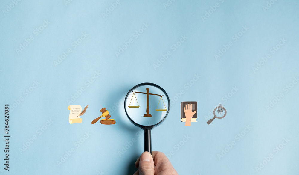 Concept of legal advice in companies. Magnifying glass with law icon for business legal advice, labor law. Lawyer, labor justice. - obrazy, fototapety, plakaty 
