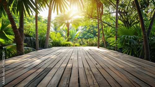 Empty wooden terrace with tropical style tree garden background