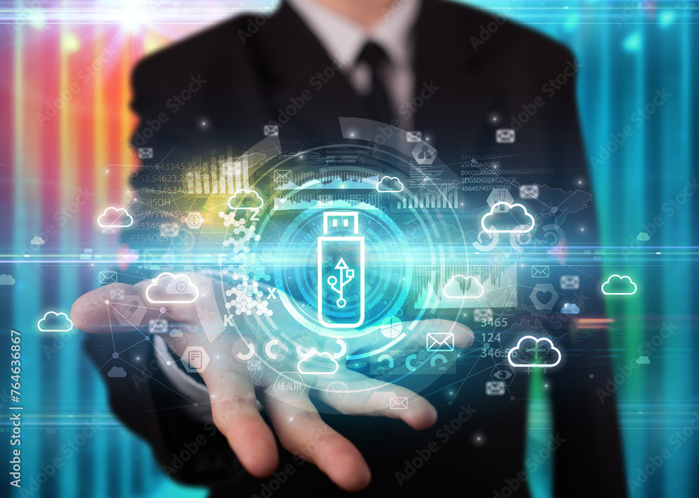 Businessman holding technology icon concept Businessman holding technology icon concept