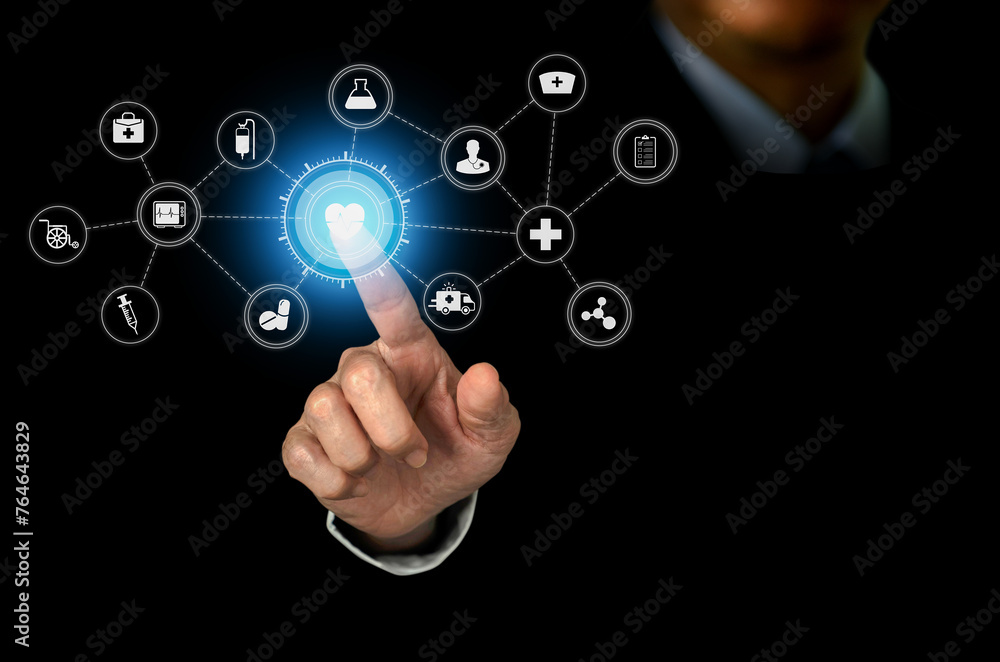 Businessman hand touching at heart icon and con medical connection with modern virtual screen interface, medical technology concept. Businessman hand touching at heart icon and con medical connection with modern virtual screen interface, medical technology concept.