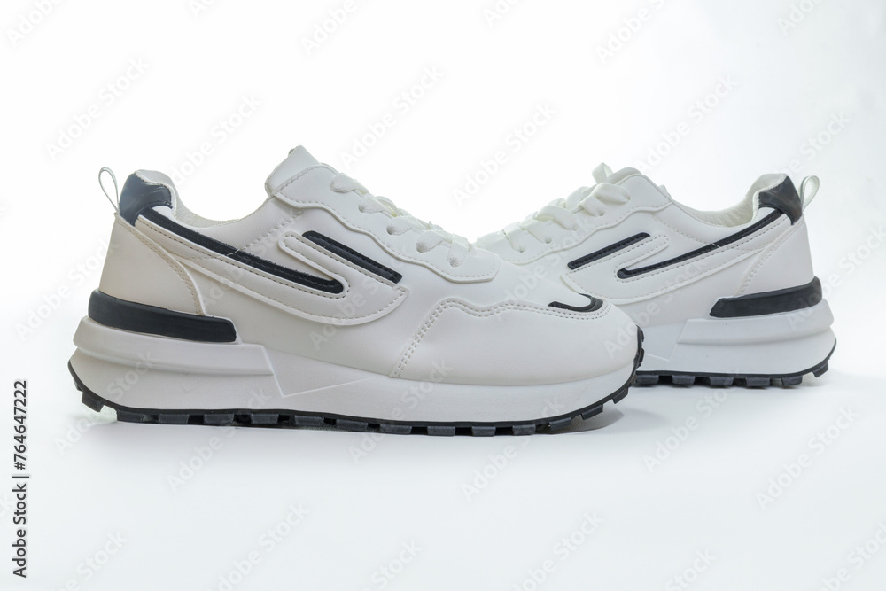 White sports sneakers on a white background White sports sneakers on a white background