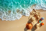 Tropical Beach Vacation Concept with Sand, Sea Waves, Sun Hat, and Colorful Balls on Sunny Shoreline