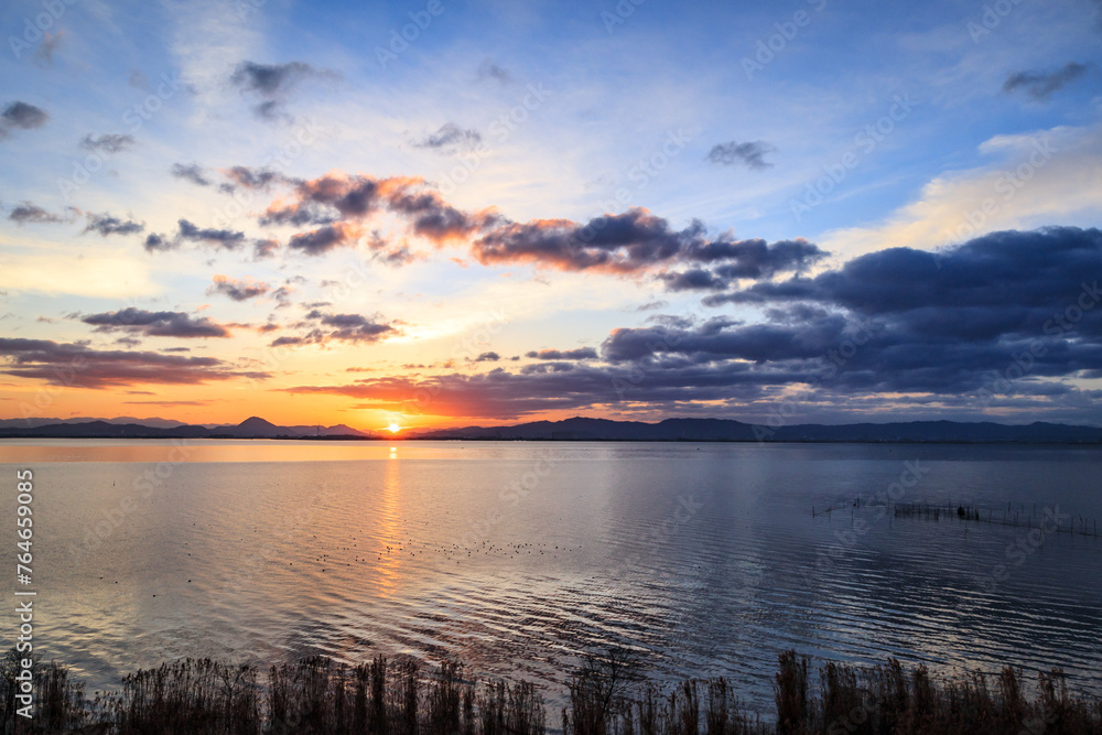 Dawn’s First Light: Serene Sunrise at Lake Biwako, Japan