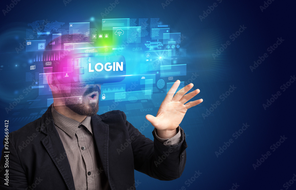 Businessman looking through Virtual Reality glasses Businessman looking through Virtual Reality glasses