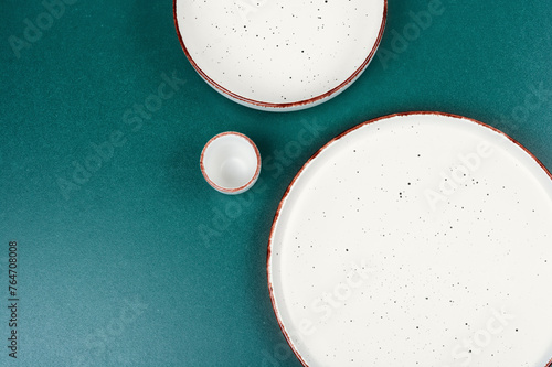 Empty round ceramic plate set.