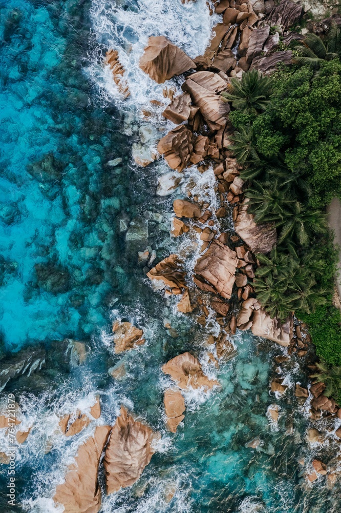 drone view ocean with rocks and waves