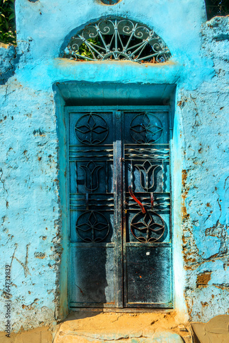 Colorful blue nubian door in Elephantine island, Aswan, Egypt