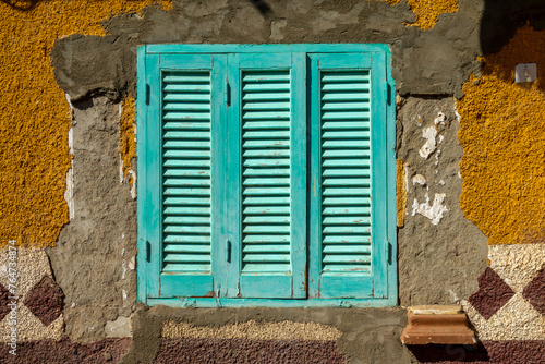 Colorful blue wood window with shutters in Elephantine island, Aswan, Egypt