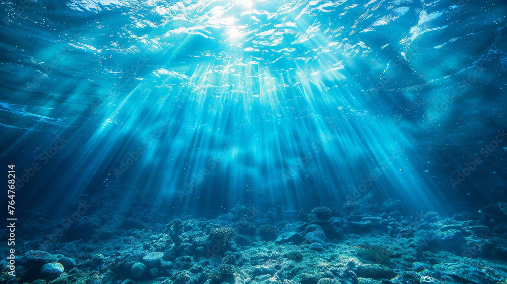 Underwater Serenity: Sunlight Piercing Through Ocean Depths Underwater Serenity: Sunlight Piercing Through Ocean Depths
