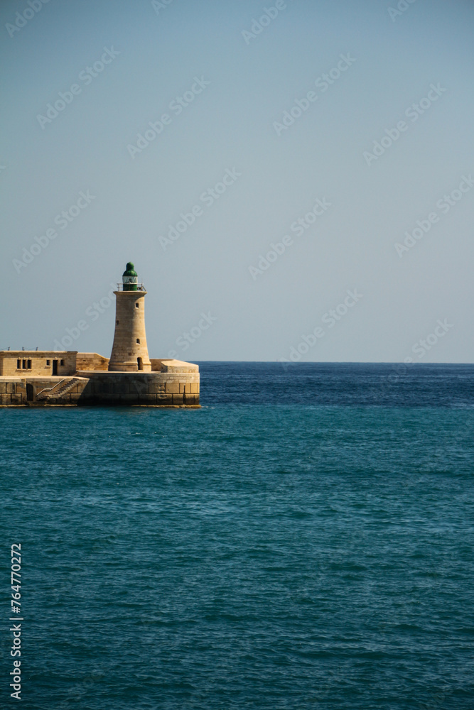 Lighthouse in the port. Lighthouse in the port.