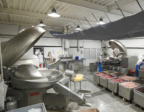 Preparation of minced meat at meat processing plant. Raw materials for sausages and sausages.
