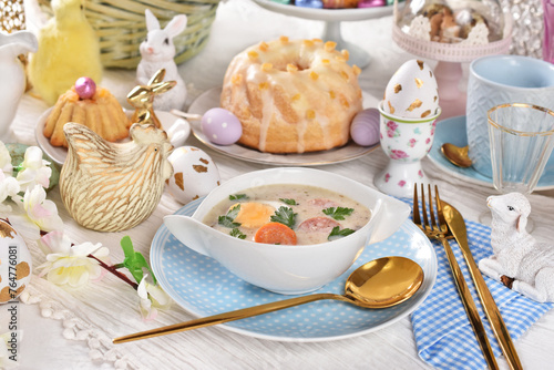 Traditional Easter white borscht on festive table