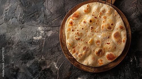 Ramadan Pita. Traditional Ramadan food as known Pide. Ramadan concept and background. Copy space and top view. photo