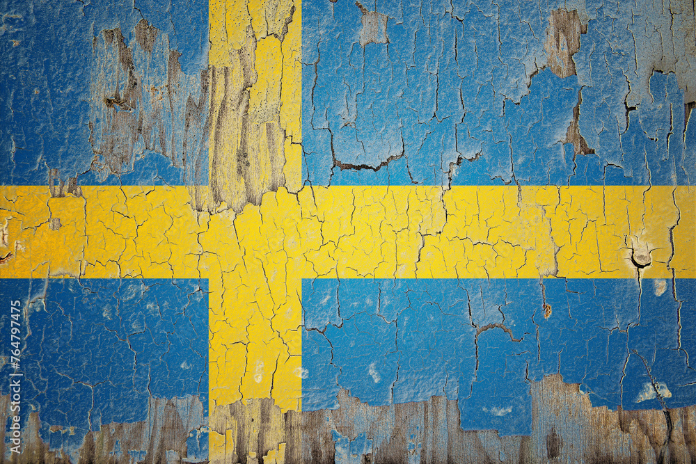 Sweden flag painted on the cracked wall