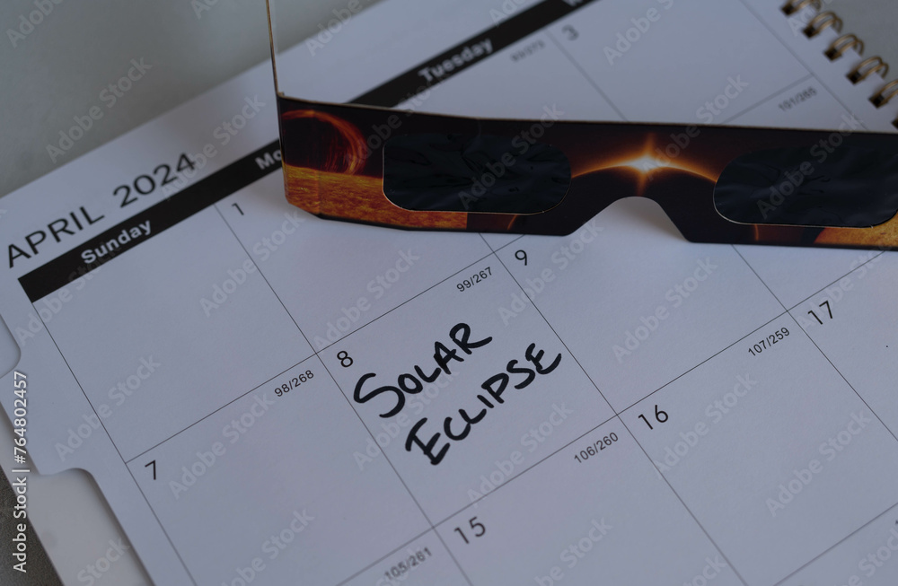Calendar reminder about the solar eclipse on Monday, April 8, 2024. - obrazy, fototapety, plakaty 