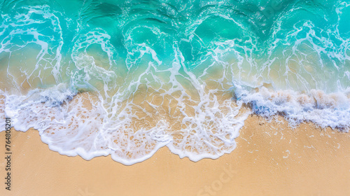 Serene Shoreline aerial view: Pristine Sandy Beach Meeting Gentle Turquoise Waves