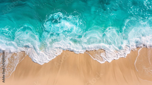 Serene Shoreline aerial view: Pristine Sandy Beach Meeting Gentle Turquoise Waves © Farnaces
