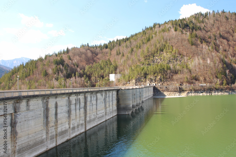 A dam with a river running through it