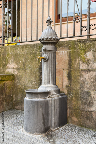 old metal fountain in the park in the city of Solsona catalonia spain photo