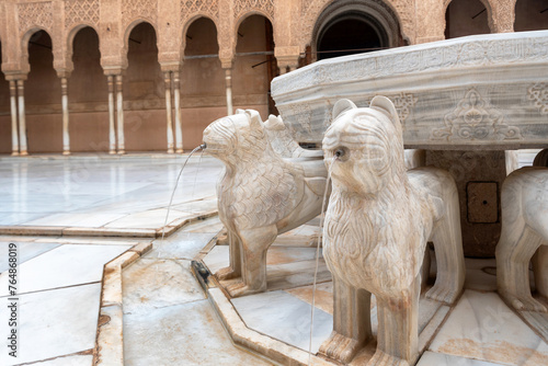GRANADA, SPAIN - AUG 25: Court of Lions in the main courtyard of the Nasrid dynasty Palace in the Alhambra, the Moorish citadel in Granada and a UNESCO World Heritage Site.