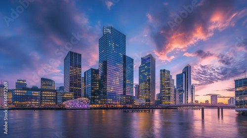 Sunset Glow on Modern City Skyline © pisan thailand