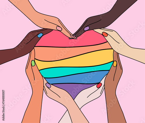 People's hands folded into rainbow pride heart silhouette. Happy pride day. LGBTQ Pride Month