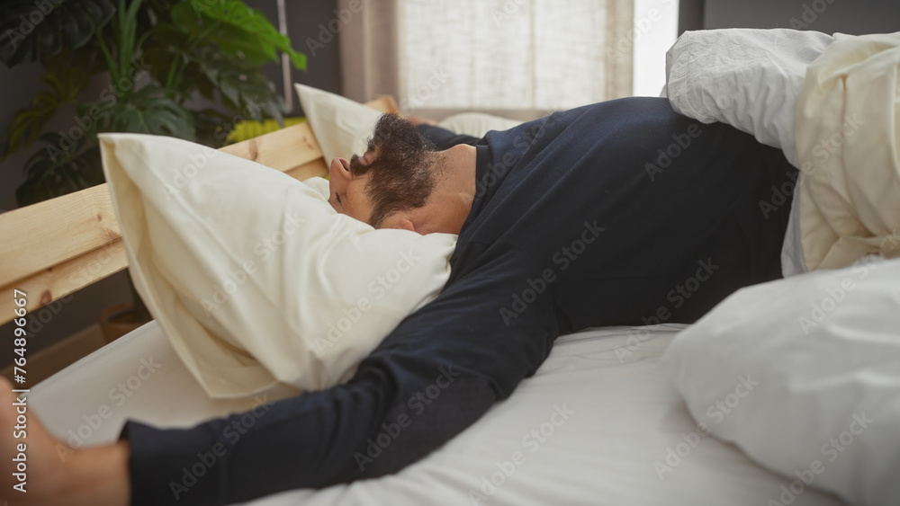 Mature man sleeping in cozy bedroom plant Mature man sleeping in cozy bedroom plant