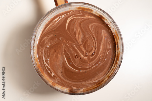 Making sauce with melting chocolate and thickened cream. Cooking Salted Caramel Chocolate Cold Cake Series.