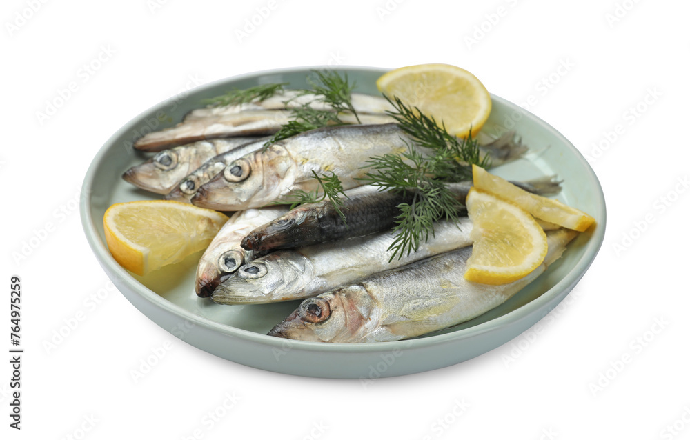 Fresh raw sprats, lemon and dill isolated on white Fresh raw sprats, lemon and dill isolated on white