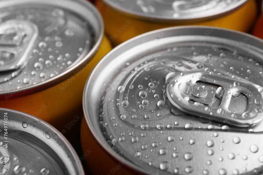 Energy drinks in wet cans, closeup. Functional beverage Energy drinks in wet cans, closeup. Functional beverage