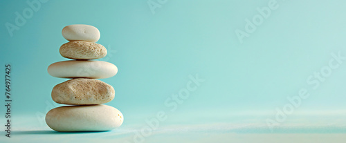 Zen Stones Balance Concept with Turquoise Background