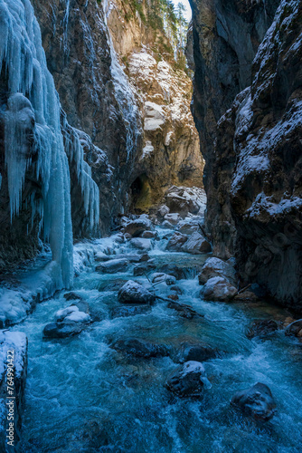A Winter walk through the Partnachklamm canyon with iceicles photo