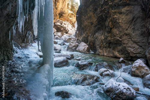A Winter walk through the Partnachklamm canyon with iceicles photo