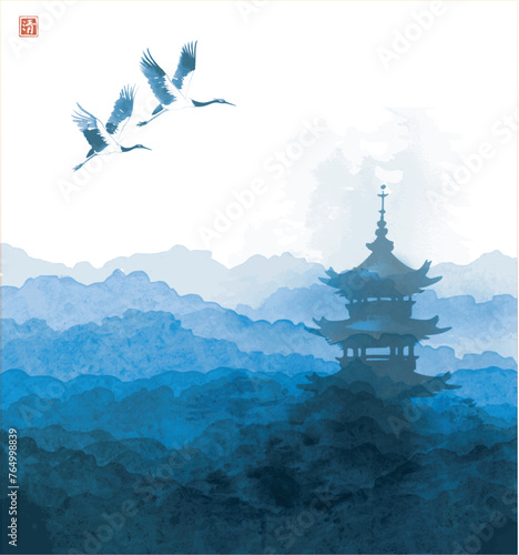 Cranes flying over a pagoda amid misty blue mountains.Traditional oriental ink painting sumi-e, u-sin, go-hua. Hieroglyph - clarity.