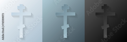 Papercut Christian cross. 3D Papercraft religious crucifix icon for posters and flyers, presentation, web, social media, design, banner, stickers, obituary, death notice or card of condolence. photo