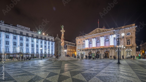 Panorama showing Municipal square with City Hall architecture decorated for Christmas and night celebrations night timelapse. Lisbon, Portugal