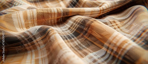 A detailed close-up view of a plaid fabric showing the intricate intersecting lines and patterns in blue and white