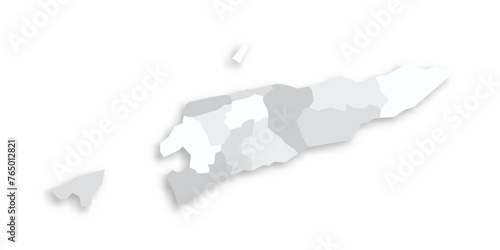 East Timor political map of administrative divisions - municipalities and Special Administrative Region Oecusse-Ambeno. Grey blank flat vector map with dropped shadow. photo