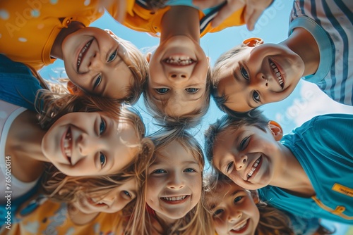 Bunch of cheerful joyful cute little children playing together and having fun. Group portrait of happy kids huddling, looking down at camera and smiling. Low angle, view from below. Generative AI photo