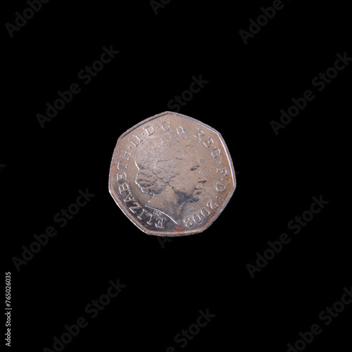 UK 50p coin on a black background. photo