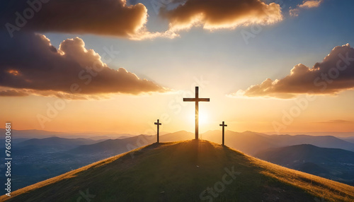 three crosses on a mountain with the sun setting behind them