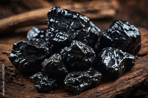 Photo of raw Shilajit. Shilajit is an ayurvedic medicine found primarily in the rocks of the Himalayas. selective focus
