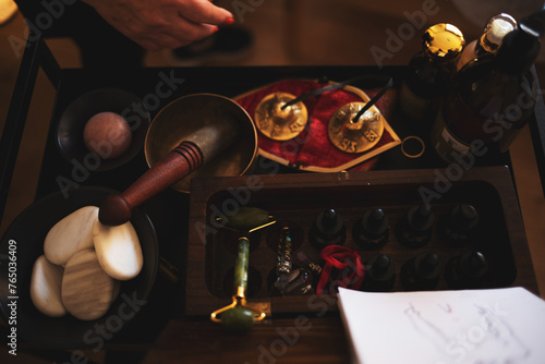 Canvas Print Table with instruments for alternative therapy (Tibetan singing bowl, aromatherapy, stones, oils